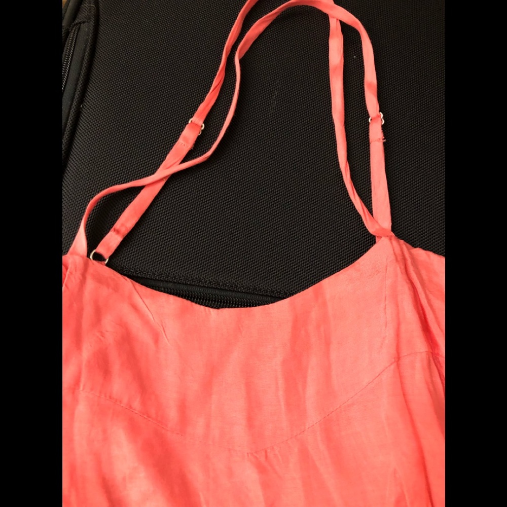 Silky sexy short dress or long top.